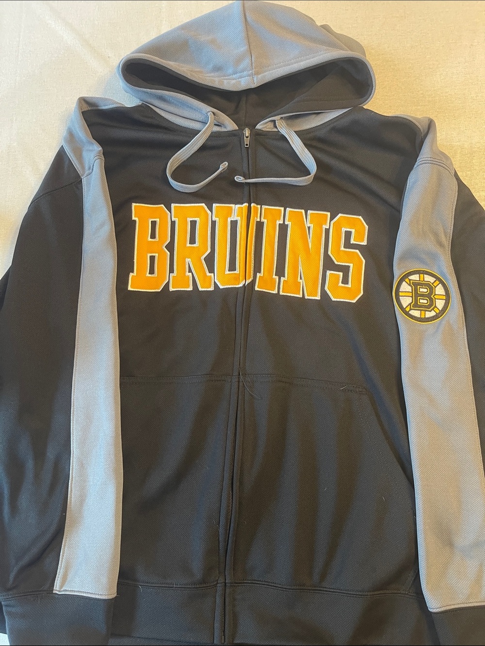 NHL Black and Gray Hooded Zip Jacket with Silver Logo Tag